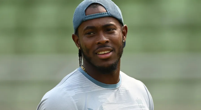 Jofra Archer ruled out of The Ashes and summer cricket due to elbow injury. Archer underwent an operation after recurring stress fracture. England concerned about his availability for World Cup title defense.